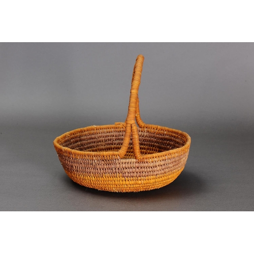 1097 - COILED PANDANUS BASKET, NORTHERN TERRITORY. Woven plant fibre. The basket is made from fibre using a... 