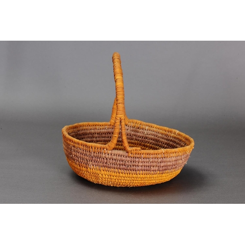 1097 - COILED PANDANUS BASKET, NORTHERN TERRITORY. Woven plant fibre. The basket is made from fibre using a... 