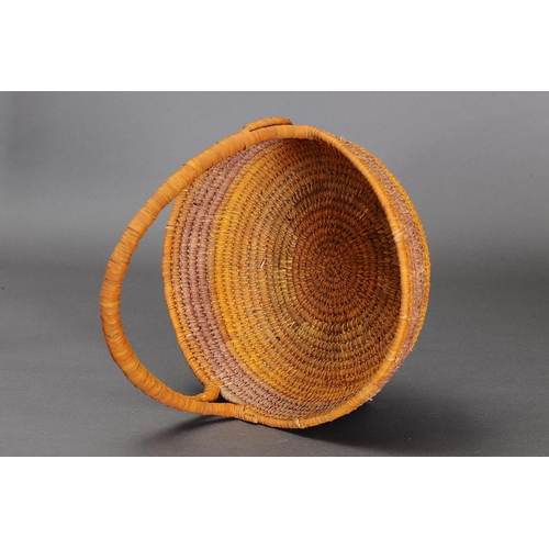 1097 - COILED PANDANUS BASKET, NORTHERN TERRITORY. Woven plant fibre. The basket is made from fibre using a... 