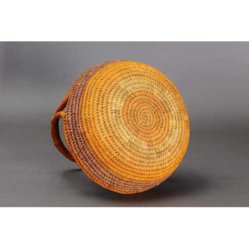 1097 - COILED PANDANUS BASKET, NORTHERN TERRITORY. Woven plant fibre. The basket is made from fibre using a... 