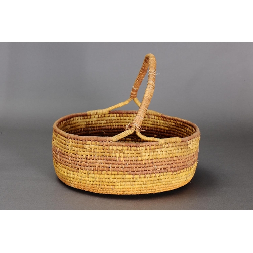 1098 - LARGE COILED PANDANUS BASKET, NORTHERN TERRITORY. Woven plant fibre. The basket is made from fibre u... 