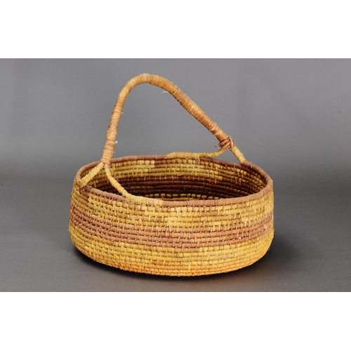 1098 - LARGE COILED PANDANUS BASKET, NORTHERN TERRITORY. Woven plant fibre. The basket is made from fibre u... 