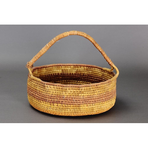 1098 - LARGE COILED PANDANUS BASKET, NORTHERN TERRITORY. Woven plant fibre. The basket is made from fibre u... 