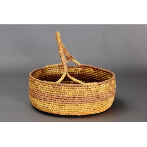 1098 - LARGE COILED PANDANUS BASKET, NORTHERN TERRITORY. Woven plant fibre. The basket is made from fibre u... 