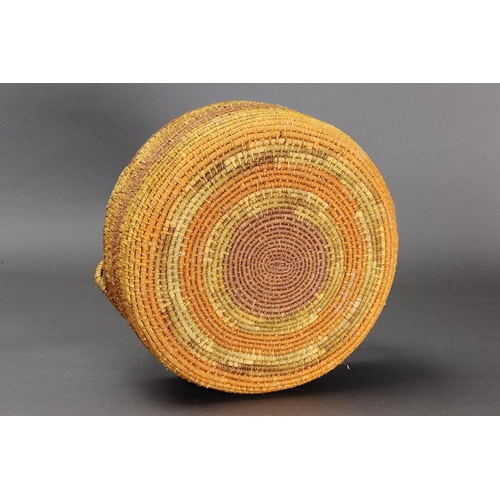 1098 - LARGE COILED PANDANUS BASKET, NORTHERN TERRITORY. Woven plant fibre. The basket is made from fibre u... 