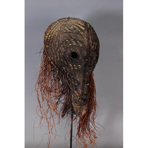 1106 - DANCE MASK (HOKORE), KARAMA VILLAGE, PAPUAN GULF, PAPUA NEW GUINEA. Woven plant fibre and natural pi... 