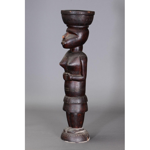 1115 - LARGE MASSIM FIGURE, TROBRIAND ISLANDS, PAPUA NEW GUINEA. Carved and engraved hardwood. Approx L70.5... 