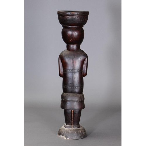 1115 - LARGE MASSIM FIGURE, TROBRIAND ISLANDS, PAPUA NEW GUINEA. Carved and engraved hardwood. Approx L70.5... 