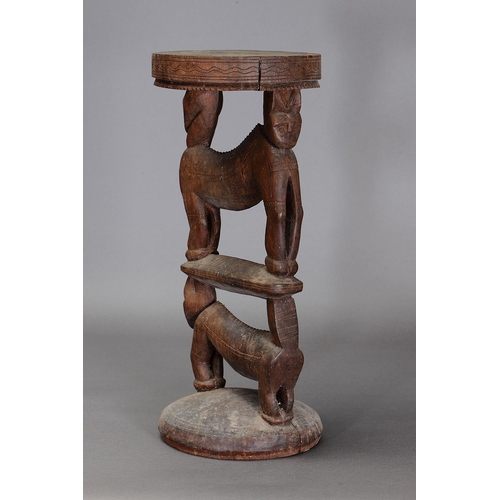 1116 - MASSIM STOOL, TROBRIAND ISLANDS, PAPUA NEW GUINEA. Carved and engraved hardwood. Approx L58 x 24.5cm... 