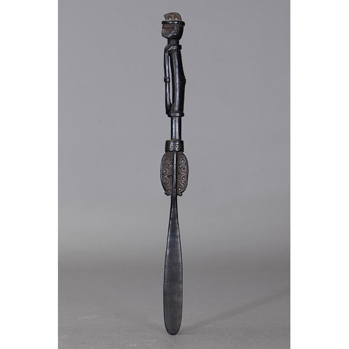 1118 - MASSIM LIME SPATULA, TROBRIAND ISLANDS, PAPUA NEW GUINEA. Carved and engraved hardwood, dark glossy ... 