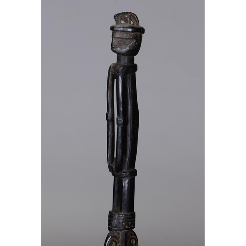 1118 - MASSIM LIME SPATULA, TROBRIAND ISLANDS, PAPUA NEW GUINEA. Carved and engraved hardwood, dark glossy ... 