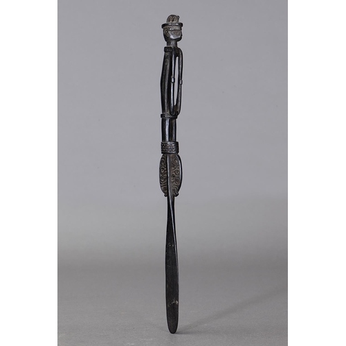 1118 - MASSIM LIME SPATULA, TROBRIAND ISLANDS, PAPUA NEW GUINEA. Carved and engraved hardwood, dark glossy ... 