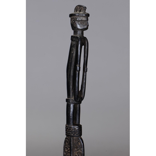 1118 - MASSIM LIME SPATULA, TROBRIAND ISLANDS, PAPUA NEW GUINEA. Carved and engraved hardwood, dark glossy ... 