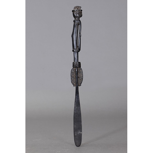 1118 - MASSIM LIME SPATULA, TROBRIAND ISLANDS, PAPUA NEW GUINEA. Carved and engraved hardwood, dark glossy ... 