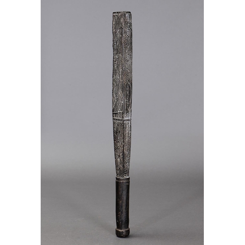 1119 - EARLY MASSIM CLUB, TROBRIAND ISLANDS, PAPUA NEW GUINEA. Carved and engraved hardwood with lime. Carv... 