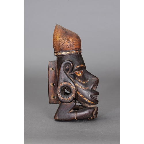 1122 - NGUZU NGUZU CANOE PROW ORNAMENT, SOLOMON ISLANDS. Carved and engraved wood, black dye, nautilus shel... 