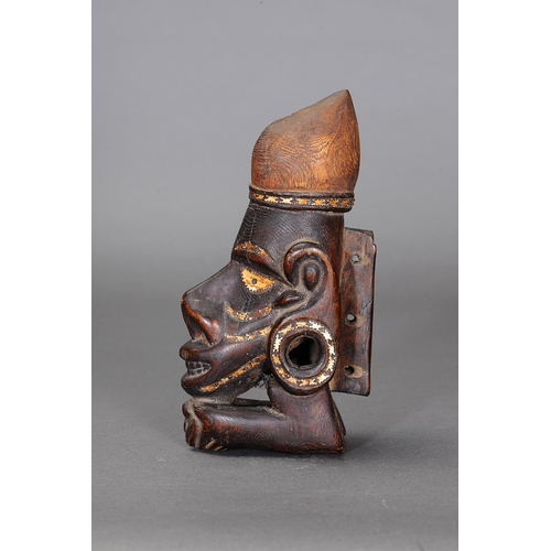 1122 - NGUZU NGUZU CANOE PROW ORNAMENT, SOLOMON ISLANDS. Carved and engraved wood, black dye, nautilus shel... 