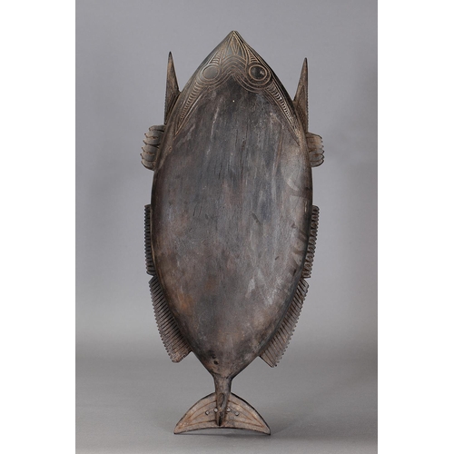 1125 - HUON GULF ICHTHYOMORPHIC BOWL, TAMI ISLANDS. Carved and engraved hardwood. Approx L62 x 28cm. PROVEN... 