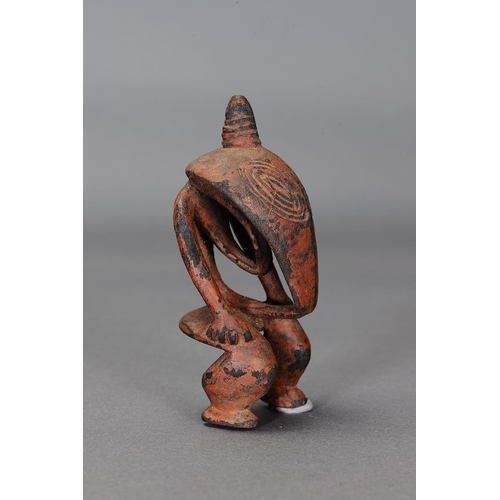 1131 - SEPIK FIGURE, PAPUA NEW GUINEA. Carved and engraved wood with natural pigments. Approx L14 x 6.5cm. ... 