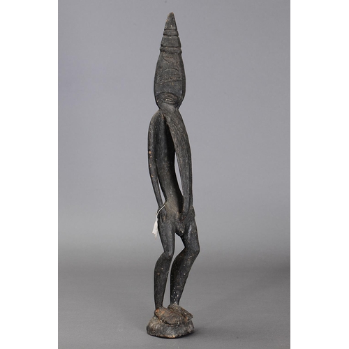 1132 - LARGE SEPIK FIGURE, PAPUA NEW GUINEA. Carved and engraved wood. Approx L63 x 10cm. PROVENANCE Ex Ech... 