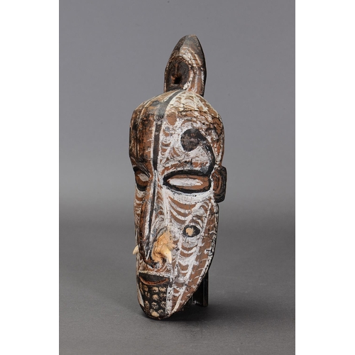 1135 - IATMUL ANCESTOR HEAD, PAPUA NEW GUINEA. Carved and engraved hardwood with natural pigments. Approx L... 