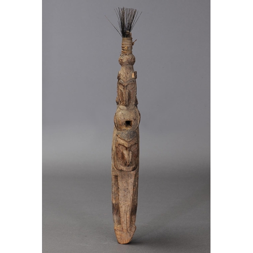 1136 - SEPIK PULLEY, LOWER SEPIK RIVER, PAPUA NEW GUINEA. Carved and engraved hardwood with natural fibre. ... 