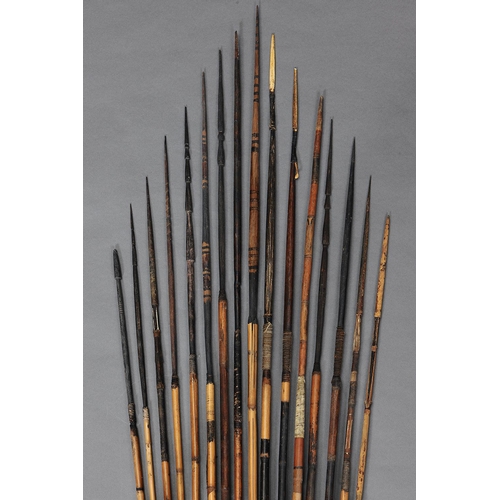 1146 - A COLLECTION OF SIXTEEN EARLY MELANESIAN ARROWS. Carved and engraved wood, bone, bamboo, with natura... 