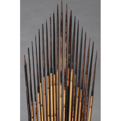 1147 - A COLLECTION OF TWENTY EARLY MELANESIAN ARROWS.  Carved and engraved wood, bone, bamboo, with natura... 