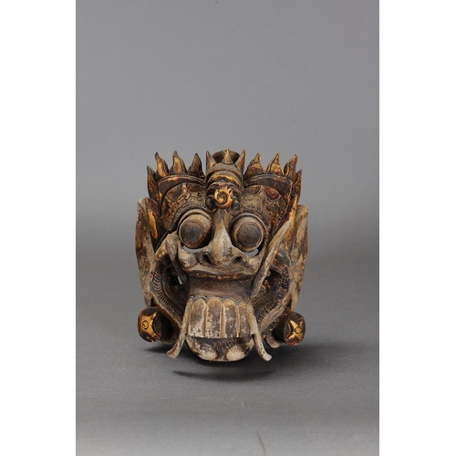 1153 - RANGDE MASK, BALI, INDONESIA. Carved and engraved pule wood and gold paint. Rangda is the demon quee... 