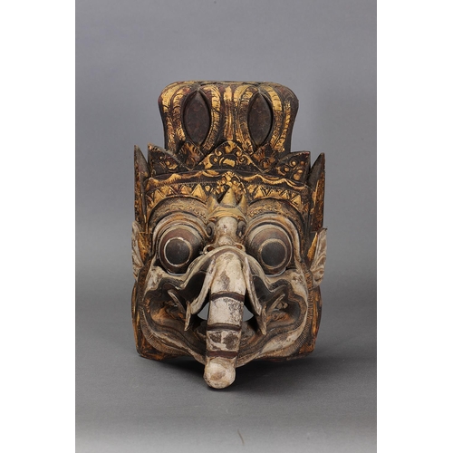 1155 - GALJA (ELEPHANT) TEMPLE MASK, BALI, INDONESIA. Carved and engraved pule wood and gold paint. Approx ... 