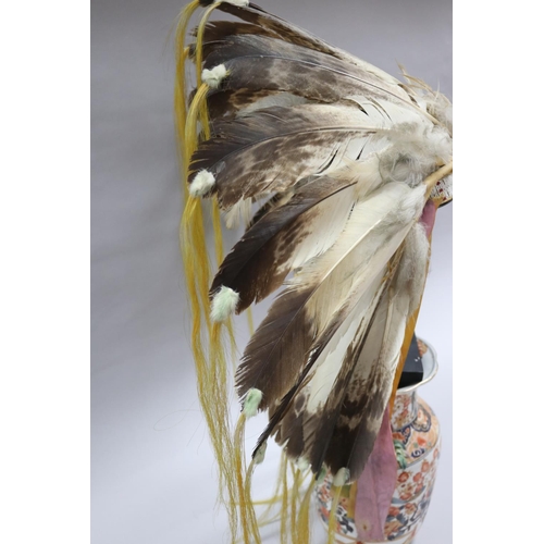 1185 - Magnificent rare Plains Indian single-trail headdress. Constructed with felt cap, front band of glas... 