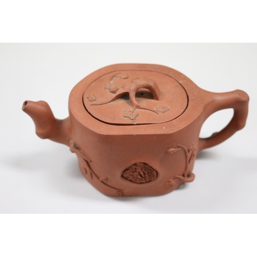 67 - Antique Yixing Zhusha clay tea pot, of bamboo and blossom design, branch form handle, approx 11cm H ... 