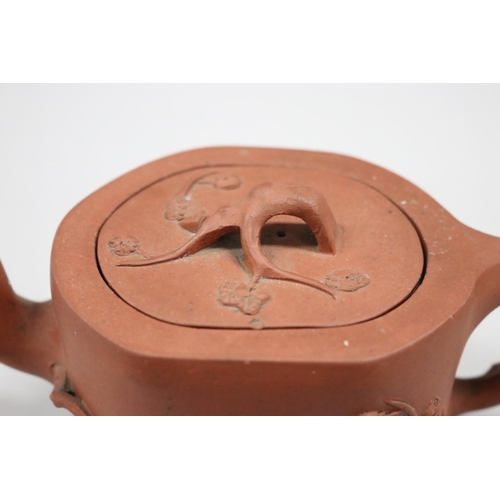 67 - Antique Yixing Zhusha clay tea pot, of bamboo and blossom design, branch form handle, approx 11cm H ... 