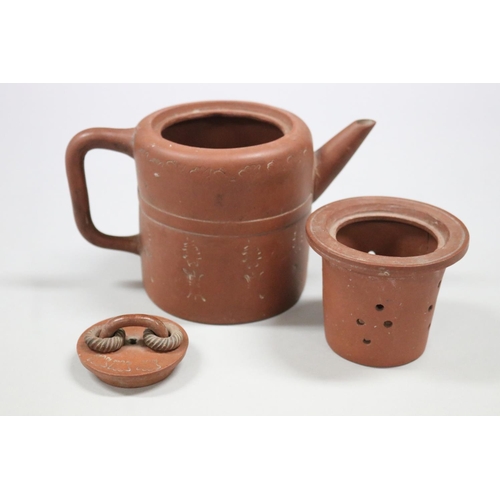 71 - Antique Chinese Yixing terracotta tea pot, of plain cylinder form, loop cover handle with two rope t... 