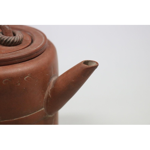 71 - Antique Chinese Yixing terracotta tea pot, of plain cylinder form, loop cover handle with two rope t... 