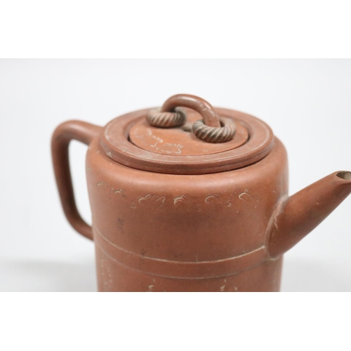 71 - Antique Chinese Yixing terracotta tea pot, of plain cylinder form, loop cover handle with two rope t... 