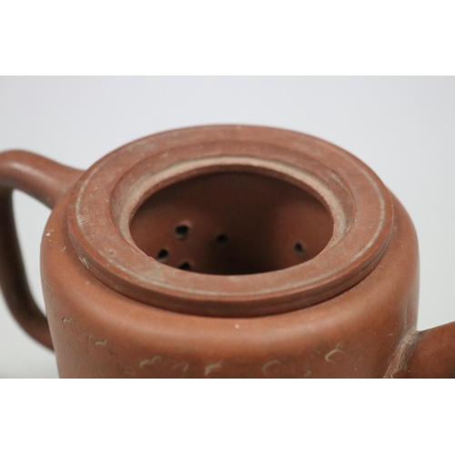 71 - Antique Chinese Yixing terracotta tea pot, of plain cylinder form, loop cover handle with two rope t... 