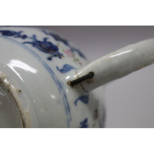 76 - Two antique 18th century tea pots, one Chinese export with replacement spout, staple repairs, along ... 