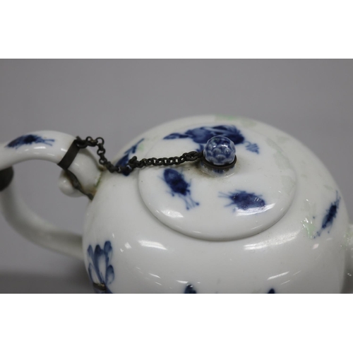 76 - Two antique 18th century tea pots, one Chinese export with replacement spout, staple repairs, along ... 