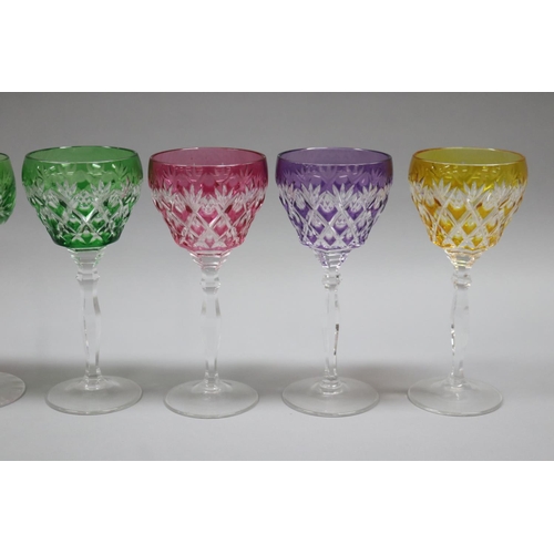 82 - Two sets of four coloured flashed cut crystal hock/wine glass, facetted stems and cut bases, 2 x 4 s... 