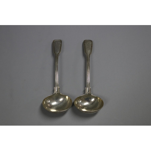 132 - Pair of antique Victorian hallmarked sterling silver fiddle and thread ladles, with crest, London 18... 