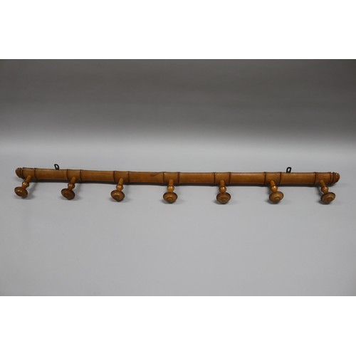 90 - Antique French faux bamboo coat rack of long form, approx 125cm W