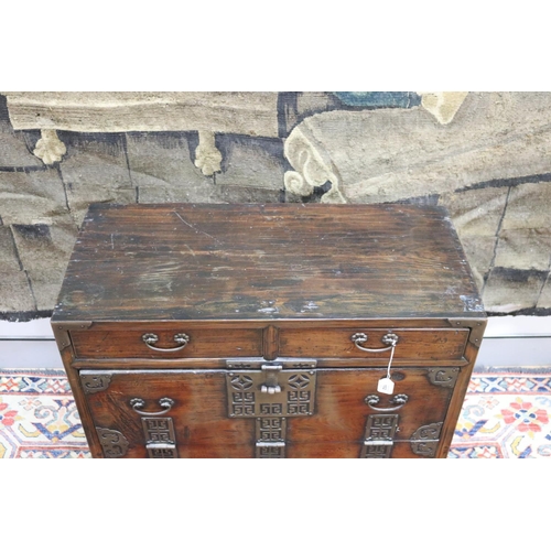 102 - Antique Japanese pierced brass mounted tansu cabinet, carry handles to the sides. Drop flap front be... 