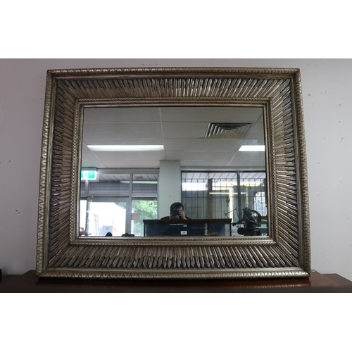 138 - Large decorative silvered wood mirror, with star burst silvered inner frame on a blue ground, approx... 