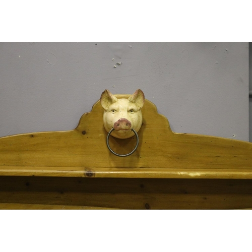 112 - Antique French wooden chopping block table, with later painted iron pigs head mount, having backboar... 