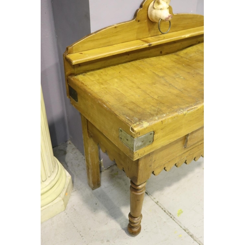 112 - Antique French wooden chopping block table, with later painted iron pigs head mount, having backboar... 