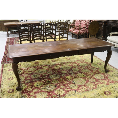 89 - Good quality French Louis XV style long table, fitted with four drawers, shaped carved apron and wel... 