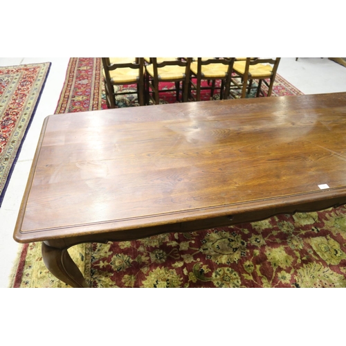 89 - Good quality French Louis XV style long table, fitted with four drawers, shaped carved apron and wel... 