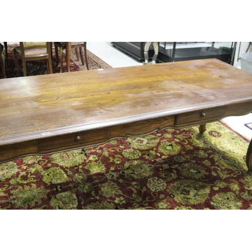 89 - Good quality French Louis XV style long table, fitted with four drawers, shaped carved apron and wel... 