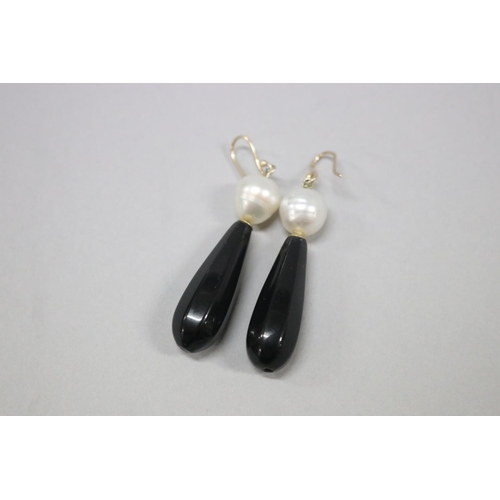 170 - Pair of baroque South Sea pearl and onyx drop hook earrings, been re-glued, approx 5cm L (2)